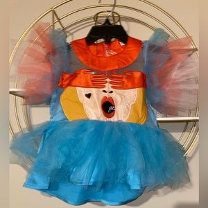 Tulle dress with sheer at the top area silk like collar with peek a boo face